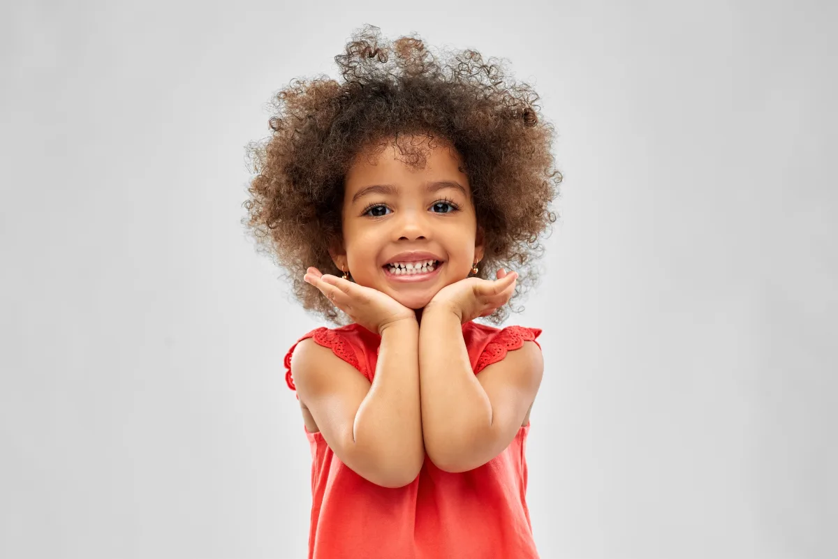 Smiling child with a healthy smile